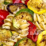Grill roasted veggies are added to the mix in this perfect pasta salad.