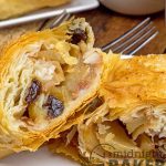 Apples and raisins spiced up with warm cinnamon and layers of flaky buttery pastry make these a real treat. Phyllo dough makes these mini apple strudels easy!