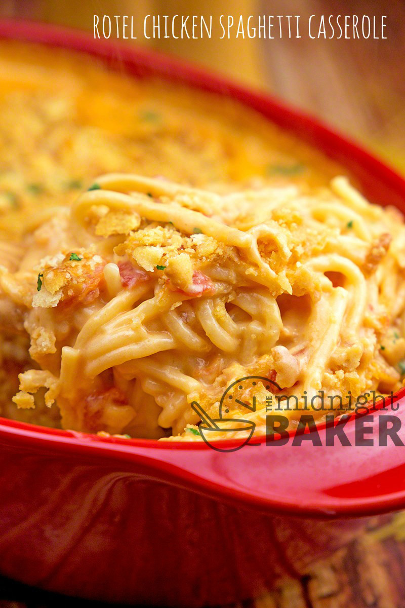 Cheesy chicken spaghetti casserole with spicy rotel tomatoes in the sauce.