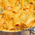 Chicken riggies is a famous dish from the Utica/Rome region of New York. It's a hearty pasta dish with marinated chicken and rigatoni in a rich tomato cream sauce. YUM!
