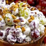 Here's a salad everyone can get into! Sweet juicy grapes in a creamy cheesecake-like dressing. Perfect for snacking.