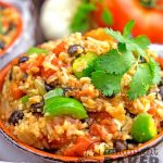 Delicious Spanish rice becomes a complete meal with the added black beans. Make it totally vegan too!