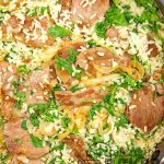 Quick and easy pork and rice skillet dinner that uses a convenience product.