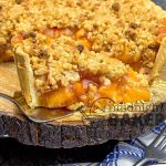 Great pie to make when peaches are in season and topped with caramel-flavored crumbs. Instructions for fool-proof crust too.